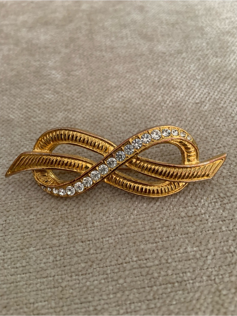 Vintage Gold and Clear Crystal Infinity Brooch